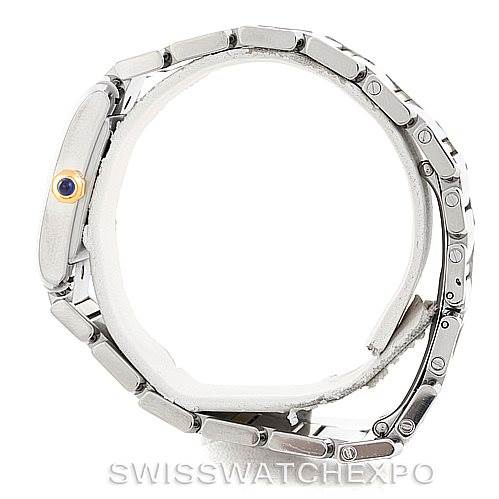 The image shows a side view of the Cartier Tank Francaise W51012Q4 Women's Steel and Gold (two tone) Silver Dial W51012Q4 Women's Steel and Gold (two tone) Silver Dial watch, highlighting its metal bracelet and crown with a blue gemstone.