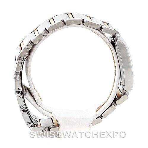 Side view of a Cartier Tank Française watch showing the bracelet and case.