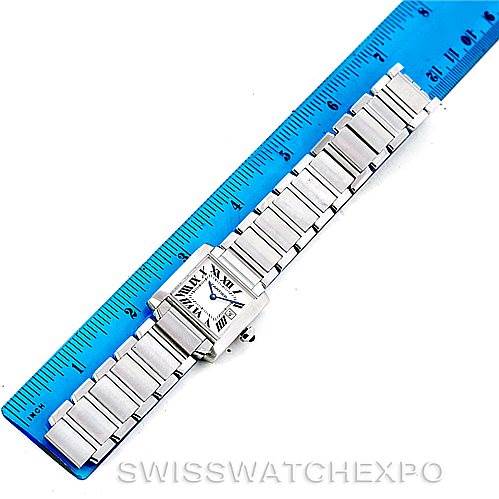 The Cartier Tank Francaise W51011Q3 Women's Stainless Steel Silver Dial W51011Q3 Women's Stainless Steel Silver Dial watch is laid flat and measured against a blue ruler, showing both the face and full bracelet.