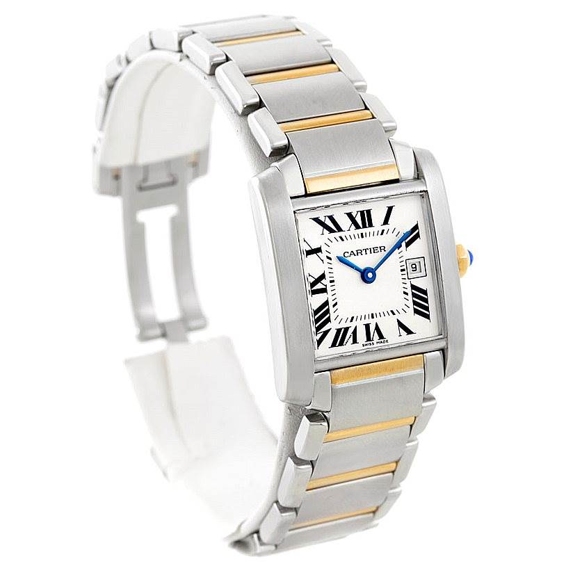 The image shows a Cartier Tank Francaise W51012Q4 Women's Steel and Gold (two tone) Silver Dial W51012Q4 Women's Steel and Gold (two tone) Silver Dial watch at a three-quarter angle, highlighting the face, bracelet, and clasp.