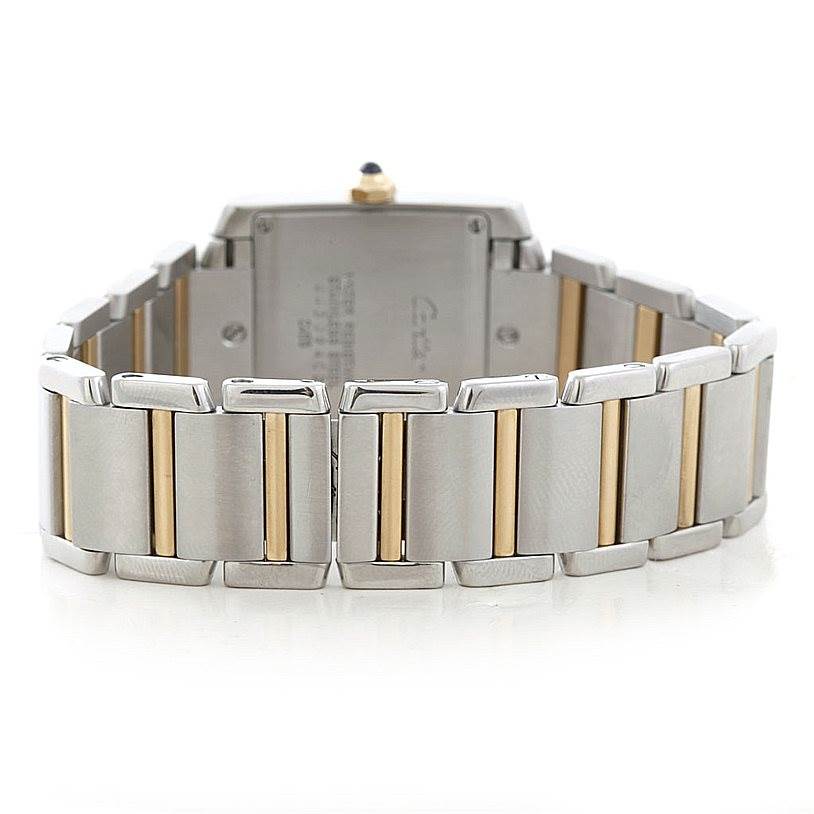 The image shows the back view of a Cartier Tank Francaise W51012Q4 Women's Steel and Gold (two tone) Silver Dial W51012Q4 Women's Steel and Gold (two tone) Silver Dial watch, focusing on the bracelet and clasp.