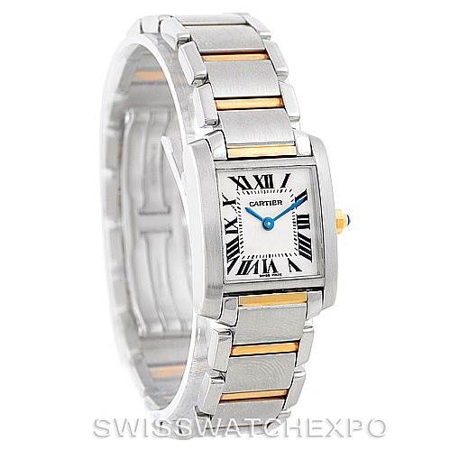 The image shows a side-angle view of a Cartier Tank Francaise W51007Q4 Women's Steel and Gold (two tone) Silver Dial W51007Q4 Women's Steel and Gold (two tone) Silver Dial watch, highlighting its rectangular face, Roman numerals, and silver and gold bracelet.