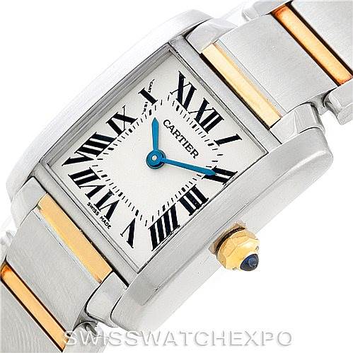 The image shows a close-up, angled view of the Cartier Tank Française watch featuring its face, bezel, crown, and partially the bracelet.