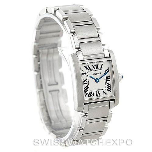The image shows a Cartier Tank Française watch at a slight side angle, highlighting its stainless steel bracelet and rectangular face.