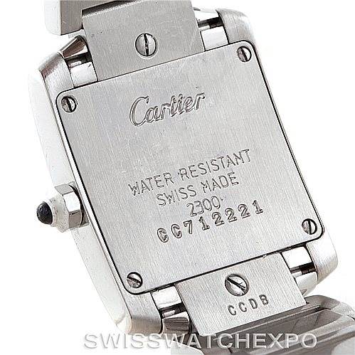 This image shows the back case of a Cartier Tank Francaise W51008Q3 Women's Stainless Steel Silver Dial W51008Q3 Women's Stainless Steel Silver Dial watch, highlighting its engraved details and bracelet attachments.