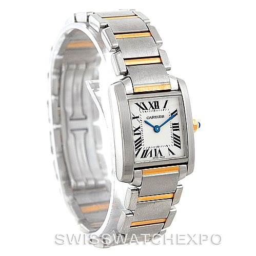 This image shows a Cartier Tank Francaise W51007Q4 Women's Steel and Gold (two tone) Silver Dial W51007Q4 Women's Steel and Gold (two tone) Silver Dial watch from an angled front view, highlighting the dial, the bracelet links, and the blue hands.