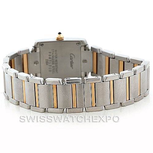 The image shows the back view of a Cartier Tank Francaise W51007Q4 Women's Steel and Gold (two tone) Silver Dial W51007Q4 Women's Steel and Gold (two tone) Silver Dial watch, focusing on the bracelet and caseback.