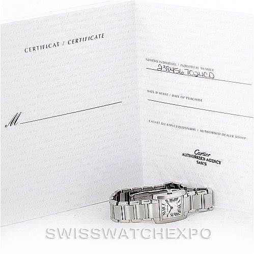 The image shows a Cartier Tank Francaise W51008Q3 Women's Stainless Steel Silver Dial W51008Q3 Women's Stainless Steel Silver Dial watch placed in front of its certificate of authenticity and warranty documents.