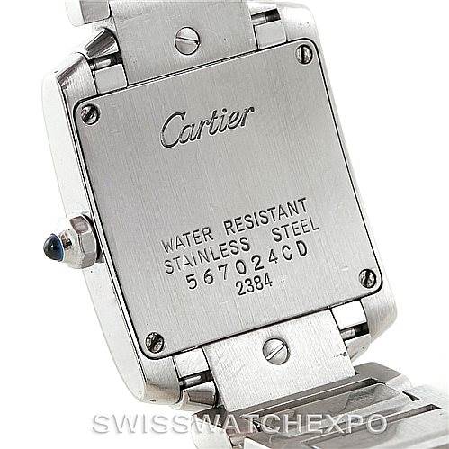 The image shows the back of a Cartier Tank Française watch, displaying the brand name, water resistance, and model details.
