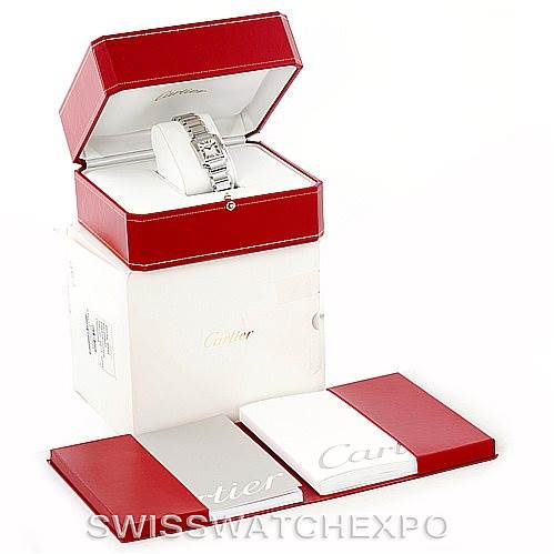 This image shows the Tank Francaise watch by Cartier in its open red box with accompanying packaging and documents.