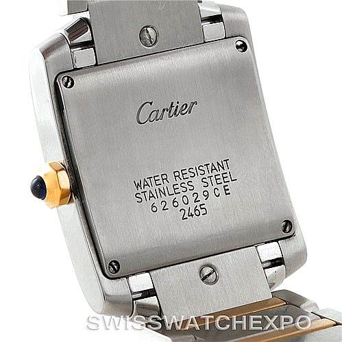 This image shows the back case of a Cartier Tank Francaise W51012Q4 Women's Steel and Gold (two tone) Silver Dial W51012Q4 Women's Steel and Gold (two tone) Silver Dial watch, highlighting the screws, water resistance engraving, and part of the bracelet.