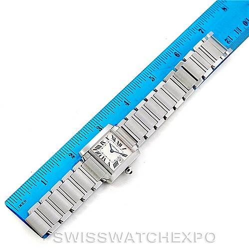 The image shows a Cartier Tank Francaise W51011Q3 Women's Stainless Steel Silver Dial W51011Q3 Women's Stainless Steel Silver Dial watch, laid flat alongside a ruler for scale.