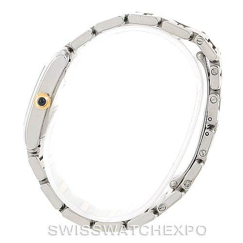 The image shows a side profile of the Cartier Tank Francaise W51012Q4 Women's Steel and Gold (two tone) Silver Dial W51012Q4 Women's Steel and Gold (two tone) Silver Dial watch, highlighting the bracelet and the crown with a blue cabochon.