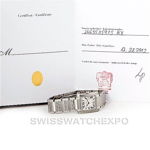 The image shows a Cartier Tank Francaise W51011Q3 Women's Stainless Steel Silver Dial W51011Q3 Women's Stainless Steel Silver Dial watch laying flat with its certificate and documentation in the background.