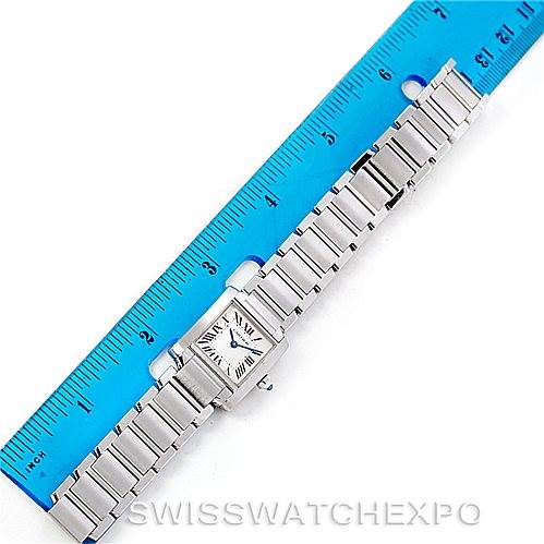 The image shows a Cartier Tank Française watch laid flat next to a ruler, displaying its full bracelet and face from a top-down angle.