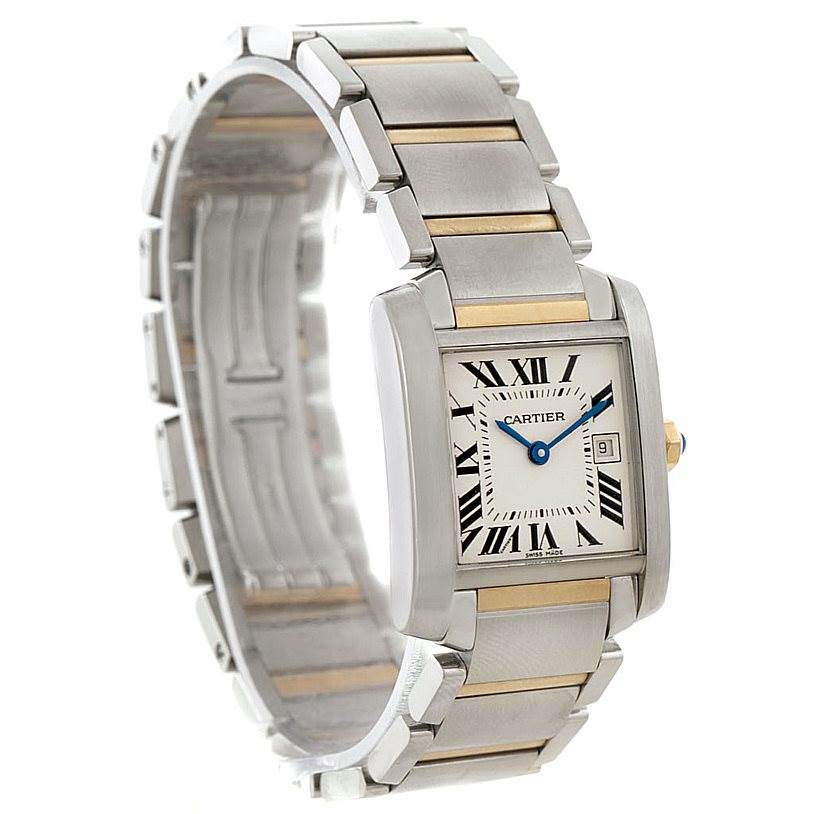 The Cartier Tank Francaise W51012Q4 Women's Steel and Gold (two tone) Silver Dial W51012Q4 Women's Steel and Gold (two tone) Silver Dial watch is shown at a slight angle, highlighting its face, Roman numerals, and metallic band with gold accents.
