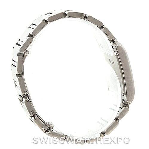 The image shows a side profile of the Cartier Tank Française watch, focusing on its stainless steel case and bracelet.