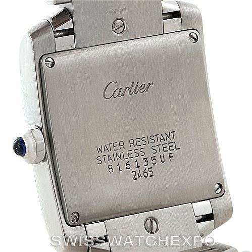 The image shows the back case of a Cartier Tank Francaise W51011Q3 Women's Stainless Steel Silver Dial W51011Q3 Women's Stainless Steel Silver Dial watch, displaying the brand and model information.