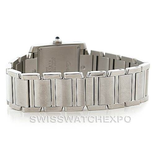 The image shows the back view of the Cartier Tank Française watch, focusing on its stainless steel bracelet.