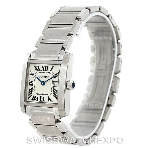 The image shows a side angle of the Cartier Tank Française watch, highlighting its rectangular face, bracelet, and crown with a blue cabochon.