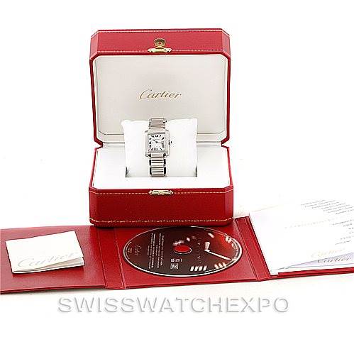 The image shows a Cartier Tank Francaise W51011Q3 Women's Stainless Steel Silver Dial W51011Q3 Women's Stainless Steel Silver Dial watch from a front angle, displayed in its open box with additional accessories laid out.