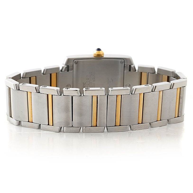 The image shows the back view of the Tank Francaise watch by Cartier, highlighting its two-tone bracelet in detail.