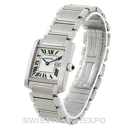 This image shows a Cartier Tank Française watch at an angle, highlighting its face, bracelet, and crown with a blue sapphire.