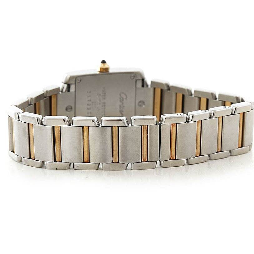 This image shows the back view of the bracelet of a Tank Francaise watch by Cartier with a mix of stainless steel and gold links.