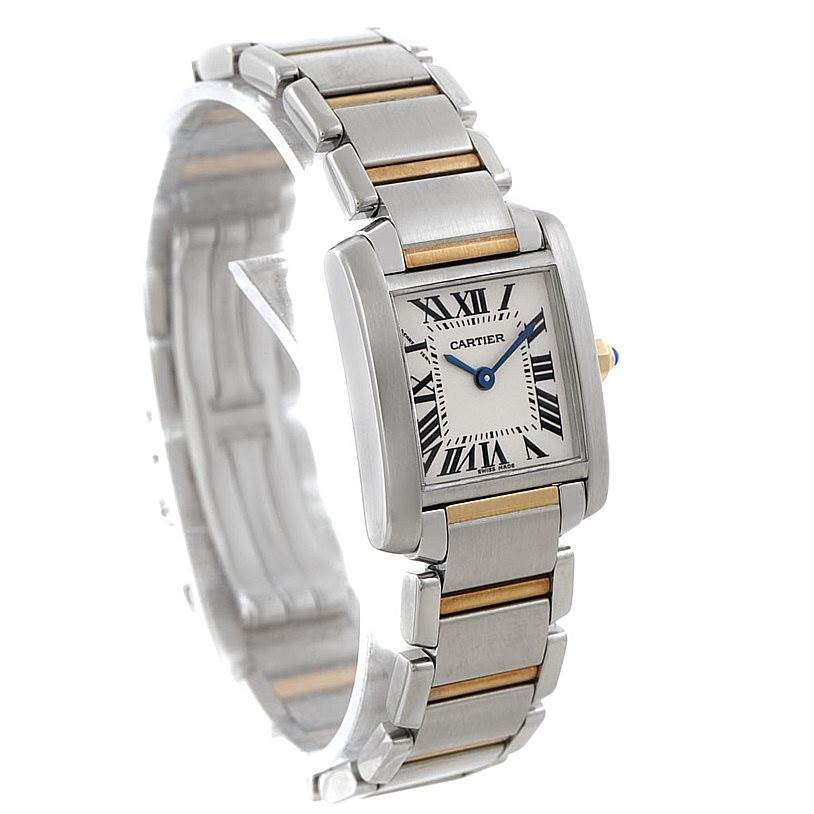The image shows a Cartier Tank Francaise W51007Q4 Women's Steel and Gold (two tone) Silver Dial W51007Q4 Women's Steel and Gold (two tone) Silver Dial watch from a three-quarter angle, highlighting its face, bracelet, and crown.