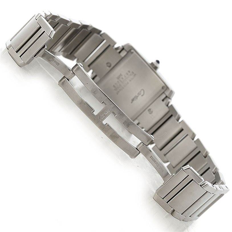 The image shows the back and bracelet clasp of a Cartier Tank Française watch.