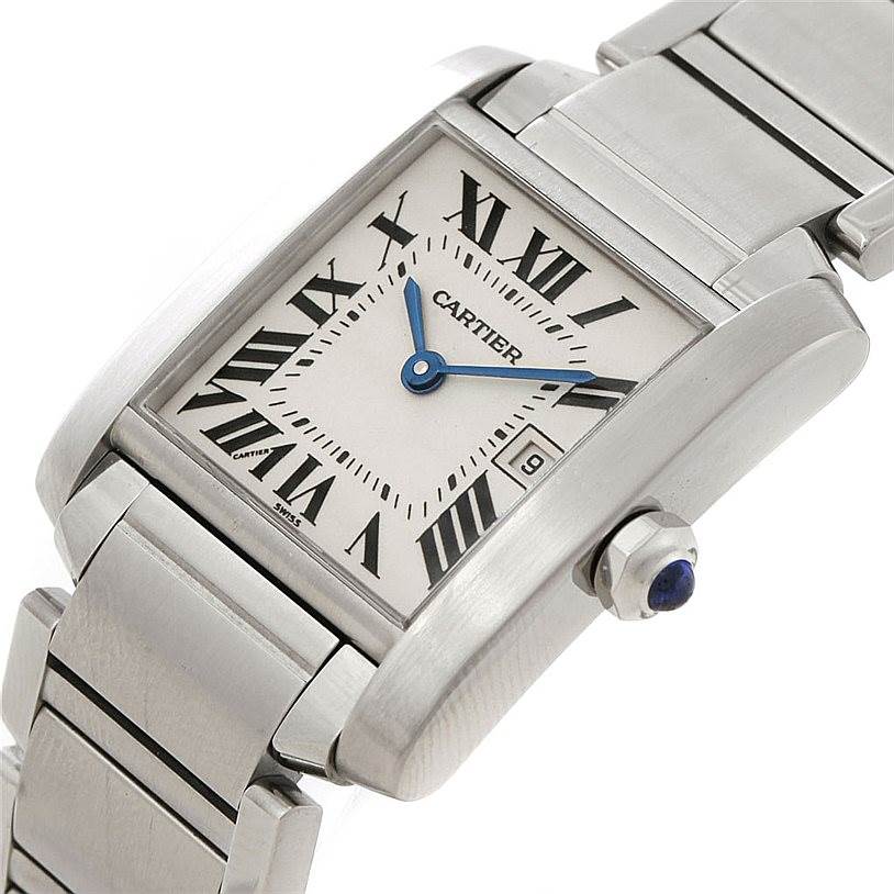 The image shows a close-up angle of the Cartier Tank Française watch, highlighting its dial, crown, and part of the bracelet.