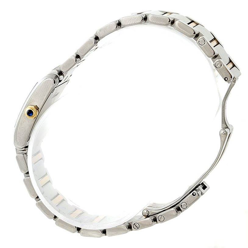 The image shows a side angle of the Cartier Tank Francaise W51007Q4 Women's Steel and Gold (two tone) Silver Dial W51007Q4 Women's Steel and Gold (two tone) Silver Dial watch, highlighting its bracelet and crown.