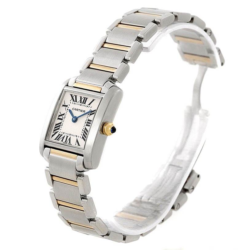 The image shows a Cartier Tank Française watch at an angled view, highlighting the dial, bezel, bracelet, and crown.