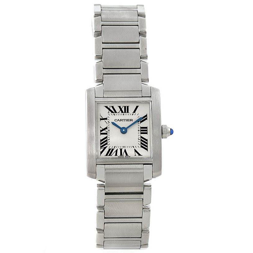 The image shows a front view of the Cartier Tank Française watch, displaying its face, metal bracelet, and crown with a blue cabochon.