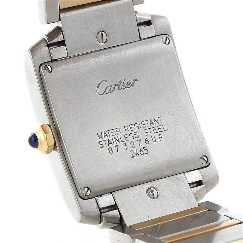This image shows the back case and part of the bracelet of a Cartier Tank Française watch, highlighting its water resistance and stainless steel features.