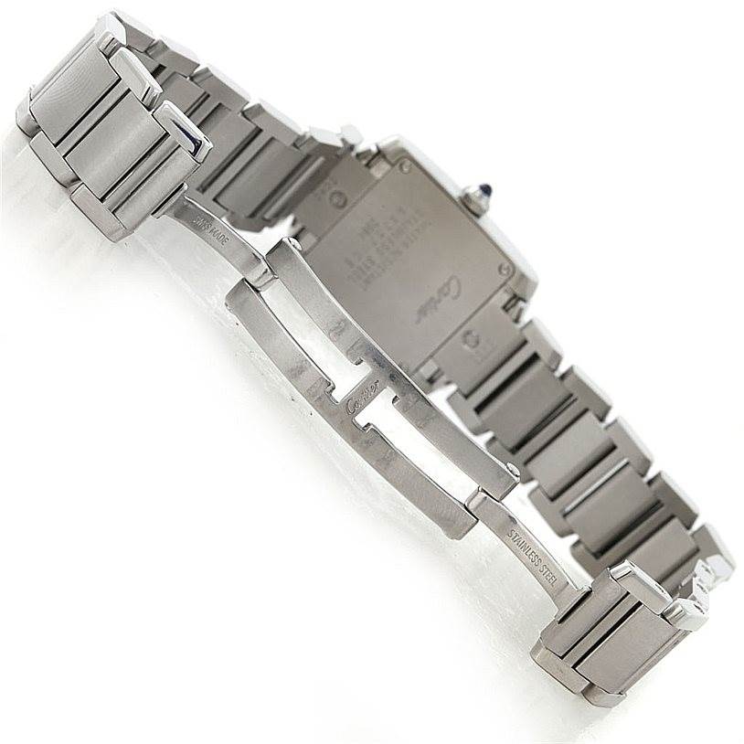 The image shows the back and clasp of a Cartier Tank Francaise W51008Q3 Women's Stainless Steel Silver Dial W51008Q3 Women's Stainless Steel Silver Dial watch with its stainless steel bracelet extended.