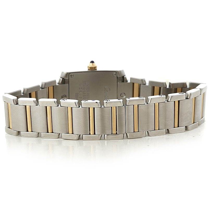 The image shows the back view of a Cartier Tank Francaise W51007Q4 Women's Steel and Gold (two tone) Silver Dial W51007Q4 Women's Steel and Gold (two tone) Silver Dial watch, focusing on the metal bracelet and clasp.