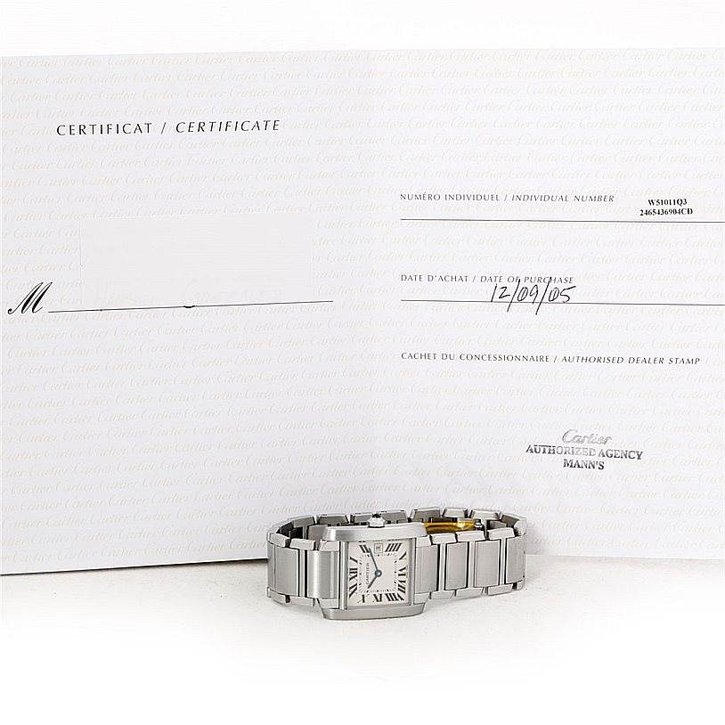 The image shows a Cartier Tank Francaise W51011Q3 Women's Stainless Steel Silver Dial W51011Q3 Women's Stainless Steel Silver Dial watch and its certificate, both viewed from a frontal angle.