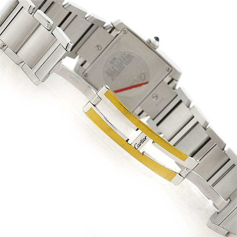 The image shows a rear view of the band and clasp of a Tank Française model by Cartier, focusing on the bracelet and clasp assembly.