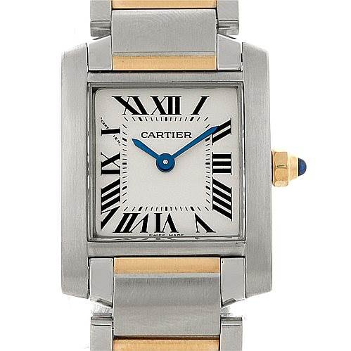 The image shows the face and part of the bracelet of the Cartier Tank Française watch, highlighting the Roman numerals, blue hands, and crown.