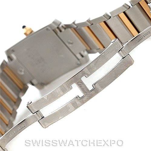 The image shows the backside and clasp of a Cartier Tank Francaise W51007Q4 Women's Steel and Gold (two tone) Silver Dial W51007Q4 Women's Steel and Gold (two tone) Silver Dial watch, highlighting its metal bracelet and signature clasp mechanism.