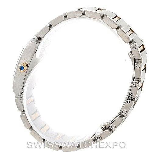 This side view shows the bracelet and crown with a blue cabochon of the Cartier Tank Francaise W51007Q4 Women's Steel and Gold (two tone) Silver Dial W51007Q4 Women's Steel and Gold (two tone) Silver Dial watch.