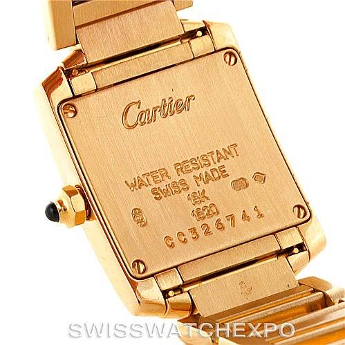 This image shows the back case and part of the bracelet of the Cartier Tank Française watch, displaying the model and serial number.