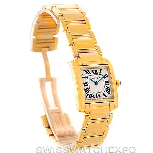The image shows a side angle of the Cartier Tank Française watch, highlighting its gold bracelet and rectangular face with Roman numerals.