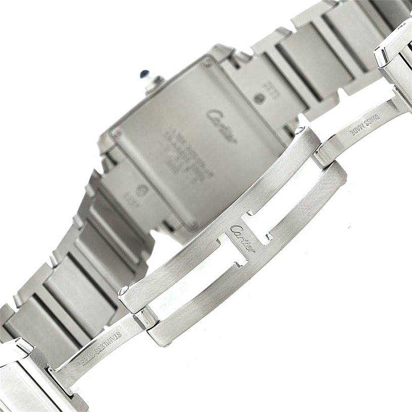 The image shows the clasp and case back of a Cartier Tank Francaise W51011Q3 Women's Stainless Steel Silver Dial W51011Q3 Women's Stainless Steel Silver Dial watch from a rear angle.
