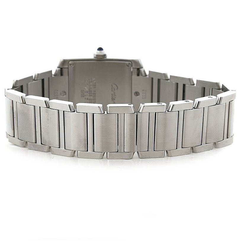 This image shows the back and metal bracelet of a Cartier Tank Française watch.