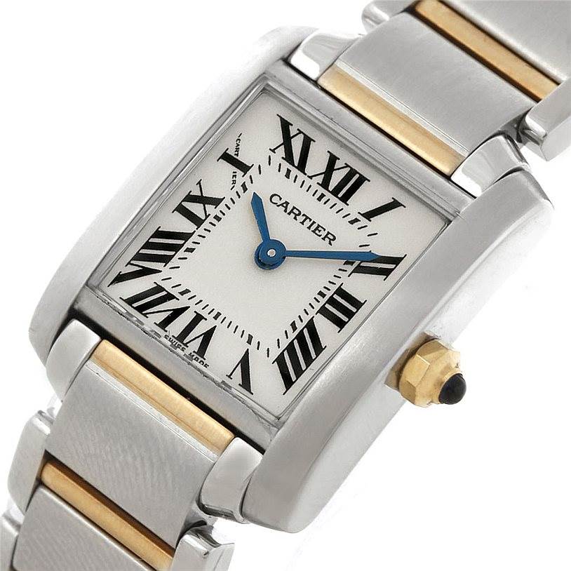 The image shows a Cartier Tank Francaise W51007Q4 Women's Steel and Gold (two tone) Silver Dial W51007Q4 Women's Steel and Gold (two tone) Silver Dial watch from a slightly angled view, highlighting the face, crown, and part of the bracelet.