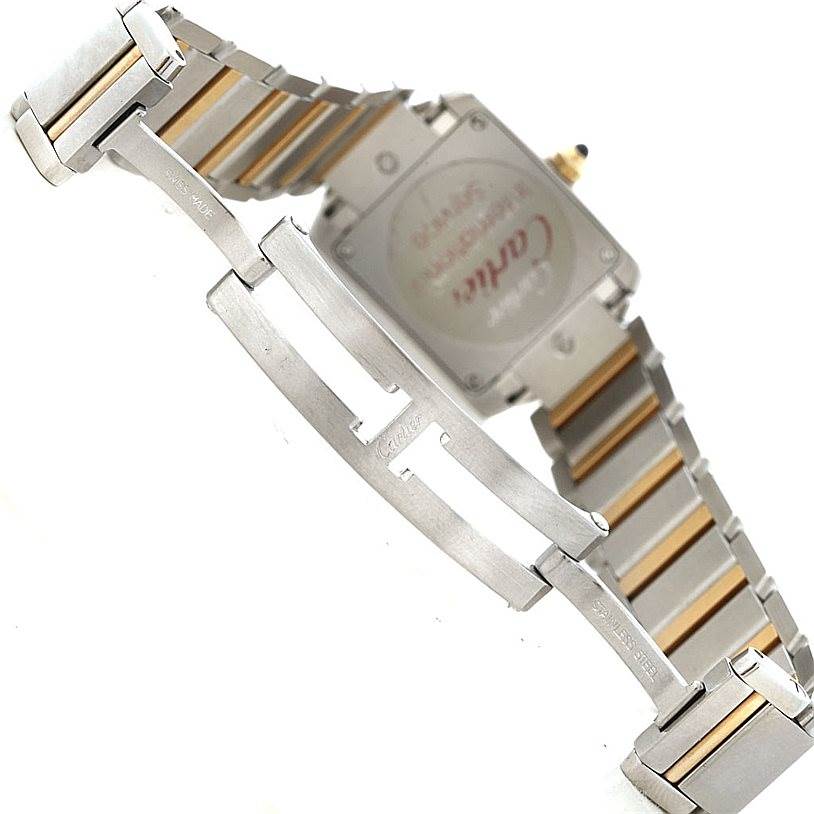 The image shows the backside of the Cartier Tank Française watch including its bracelet and clasp.