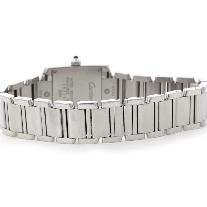 The image shows the back and bracelet of a Cartier Tank Française watch.