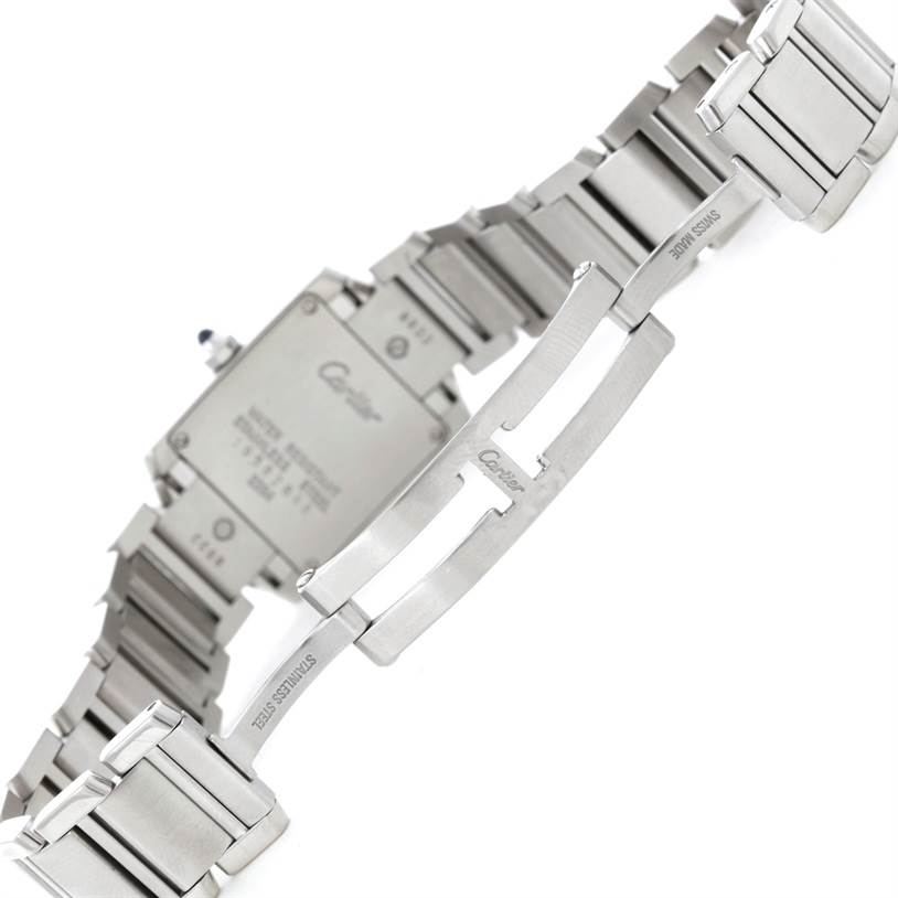 This image shows the back casing and stainless steel bracelet of the Cartier Tank Française watch.